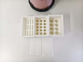 Sliding lid battery storage boxes