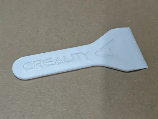 Printbead scraper with Creality logo