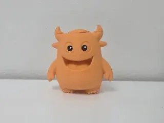 Smiling Horned Monster Open Mouth Figurine