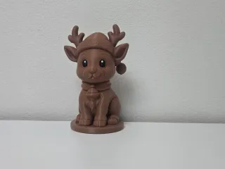 Sitting Reindeer with Hat and Bell Christmas Figure