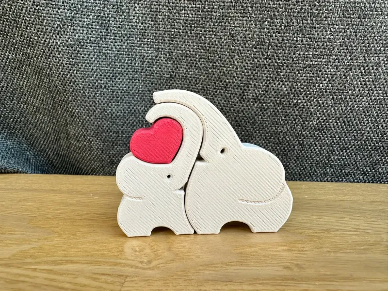 Madre elefante y cría de elefante con corazón