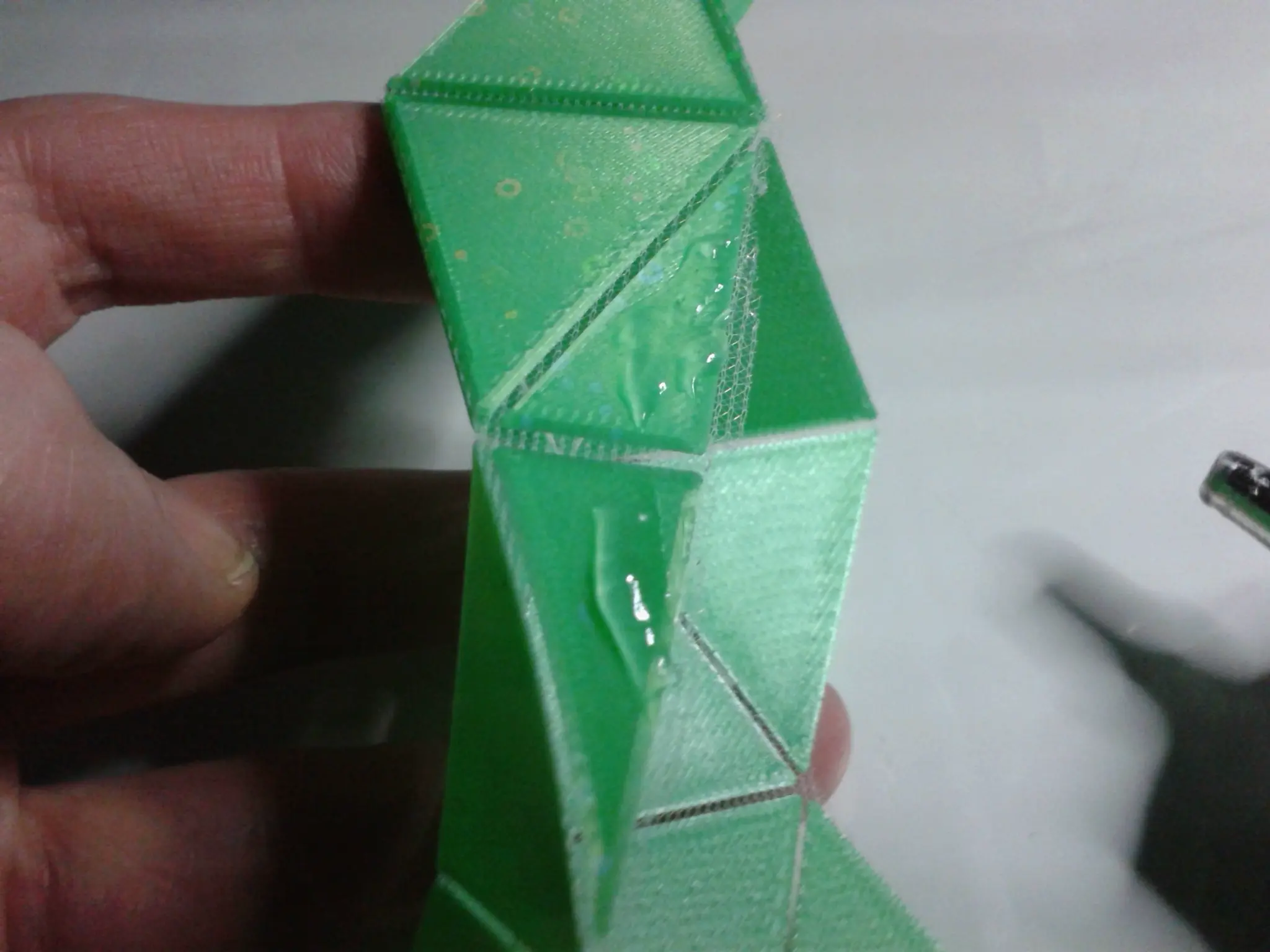 Caleidociclo con textil intercalado entre dos capas