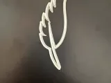 pluma-1
