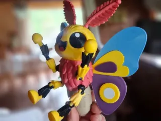 Articulated multicolored moth
