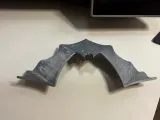 Balanced Bat standing on a tip stand-1