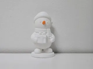 Smiling Snowman with Gift Christmas Figurine
