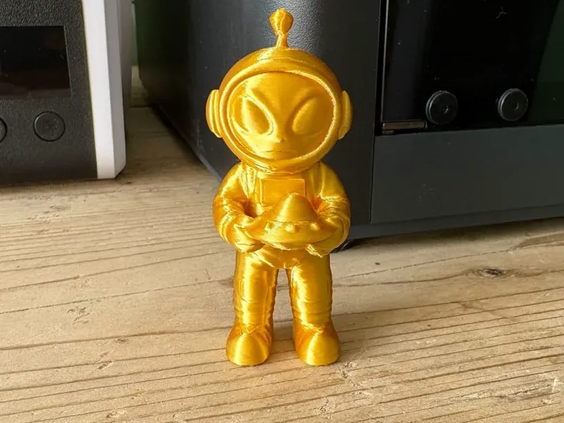 Alien Holding UFO Toy