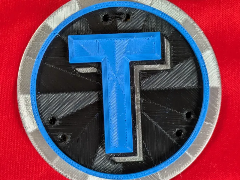 T Letter Badge - Embossed
