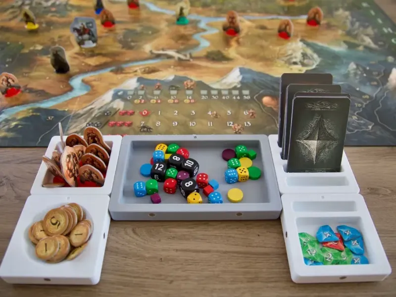 Modular tile system for organizing board game tokens