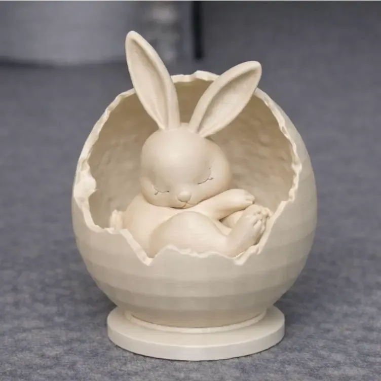 Cute bunny in egg