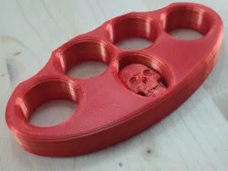 Knuckle Duster with a skull inside the body
