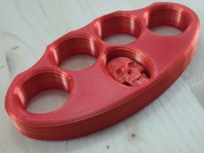 Knuckle Duster with a skull inside the body