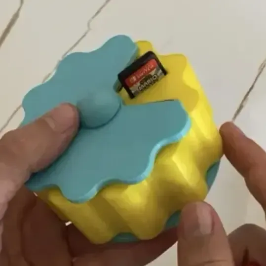 rotating Nintendo switch game holder