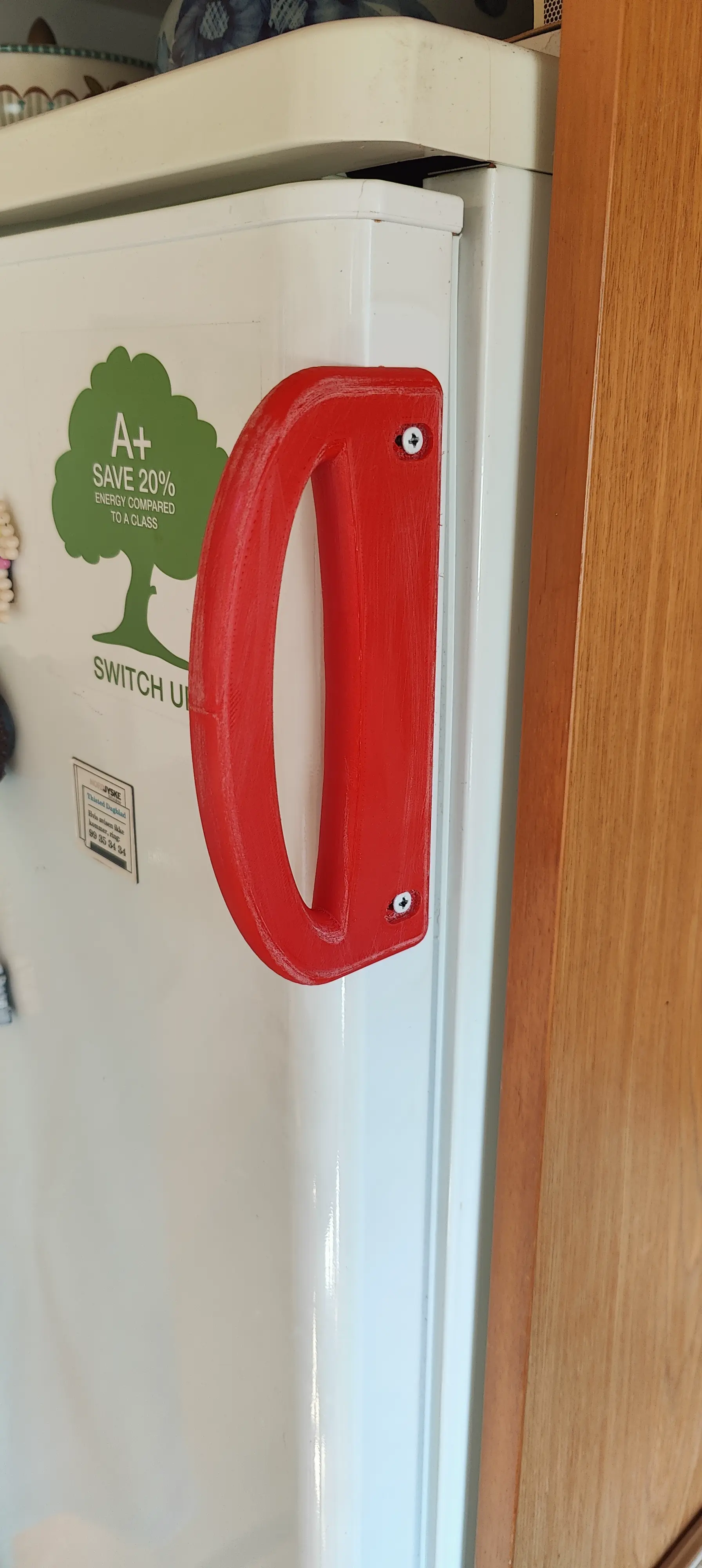 Poignée de porte du réfrigérateur