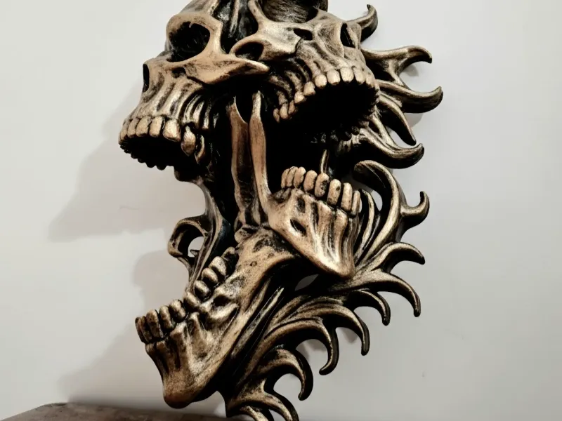 Tormented Skulls Wall Hang