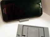 Parametric storage phone stand-2