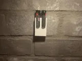 Power up twice as long with one sleek dual AA holder.-0