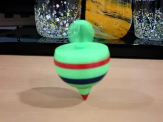 Spinning top ring