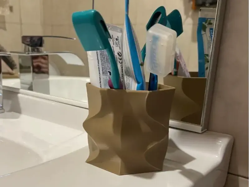 Toothbrush and toothpaste holder