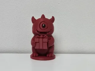 One-Eyed Monster with Gift Christmas Figure