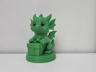 Baby Dragon with Gift Box Christmas Figurine