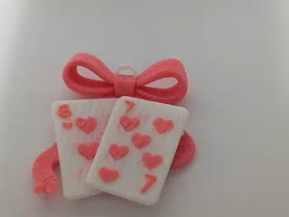 Playing Cards with a bow with 6 and 7