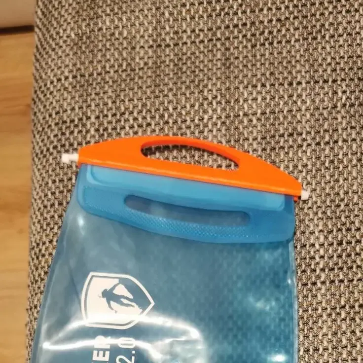 cierre / soporte para bolsa de hidratación (clip para bolsa de agua)