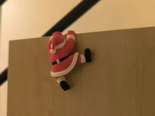 Papá Noel trepando