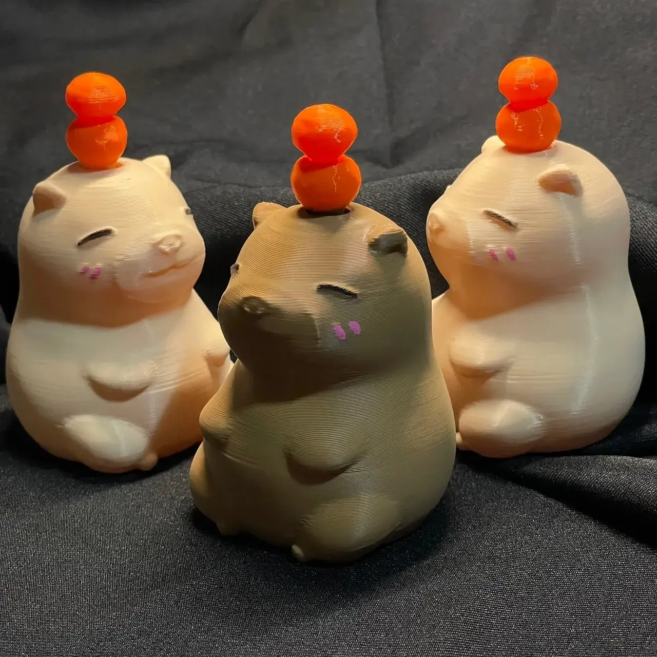 Capybara with spinning oranges