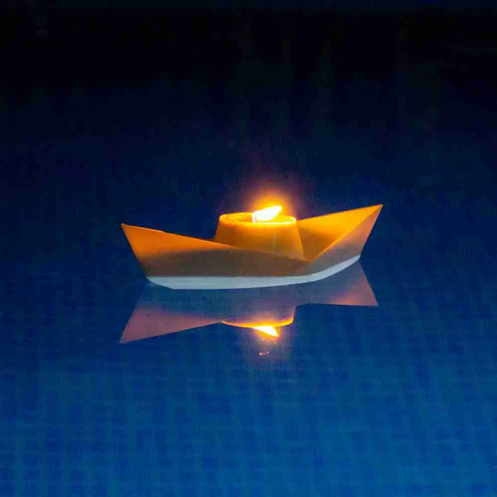 Candle holder - floating paper boat