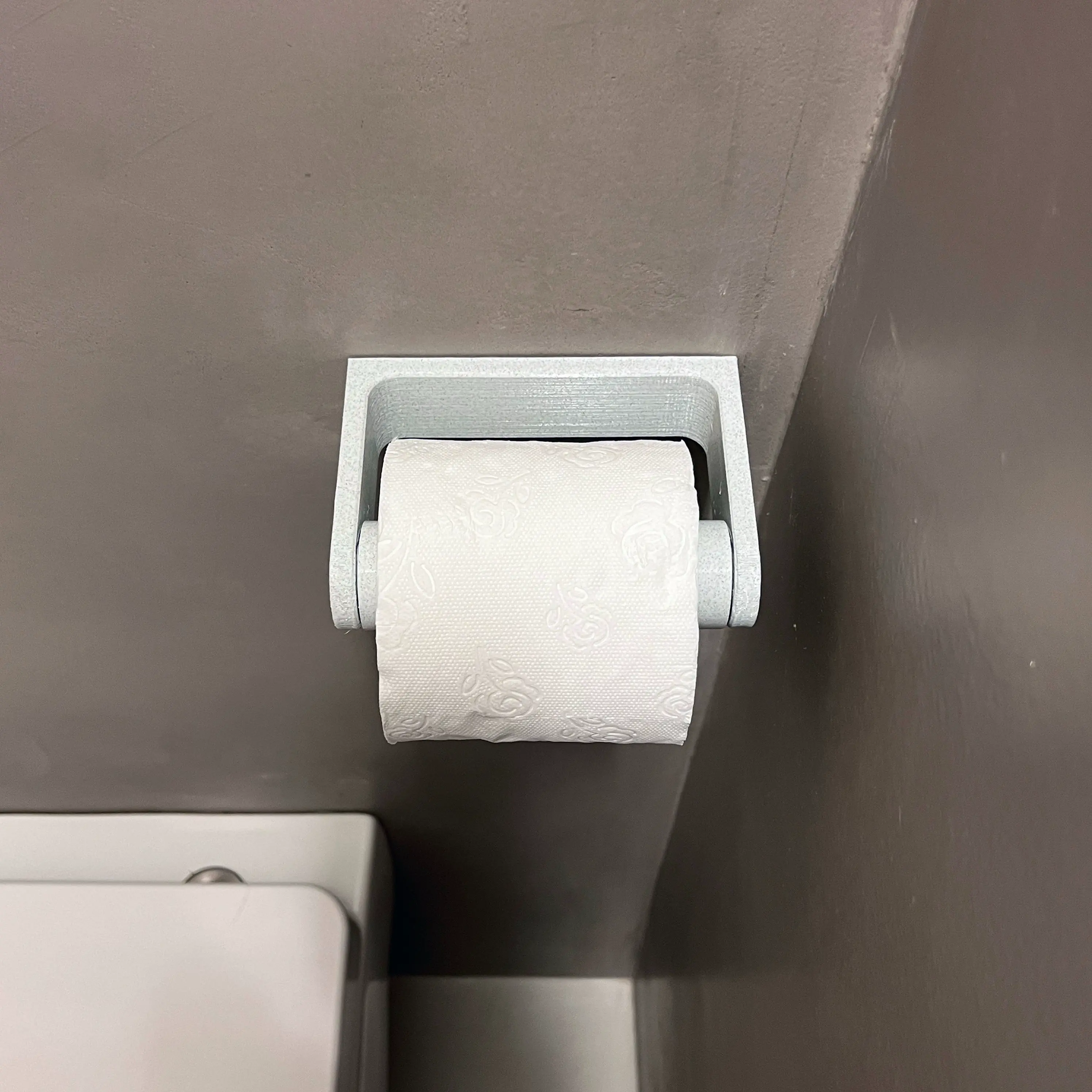 Over-engineered toilet paper holder