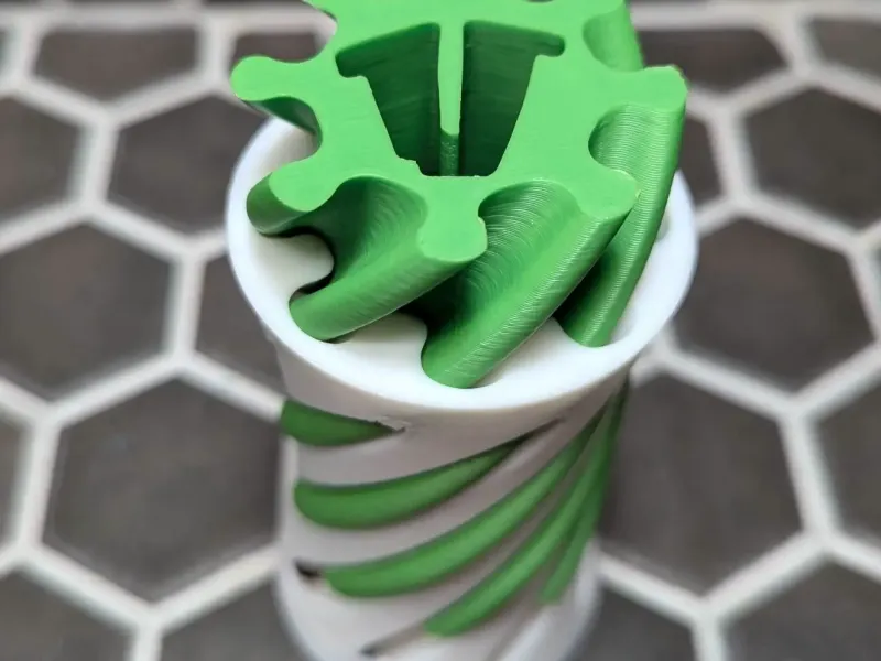 Fidget de Vórtice Espiral Letra V - Juguete de Paso 180°