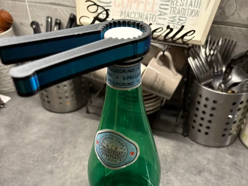 pinza abridor de botellas