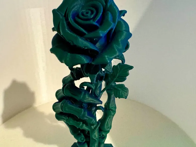 Skeletal hand rose holder