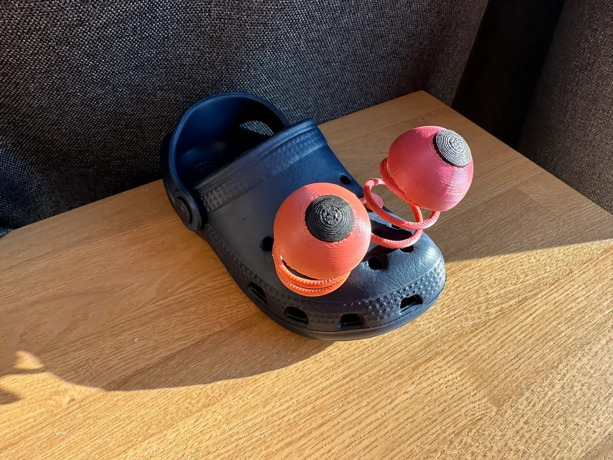 Eye on a spring shoe charm