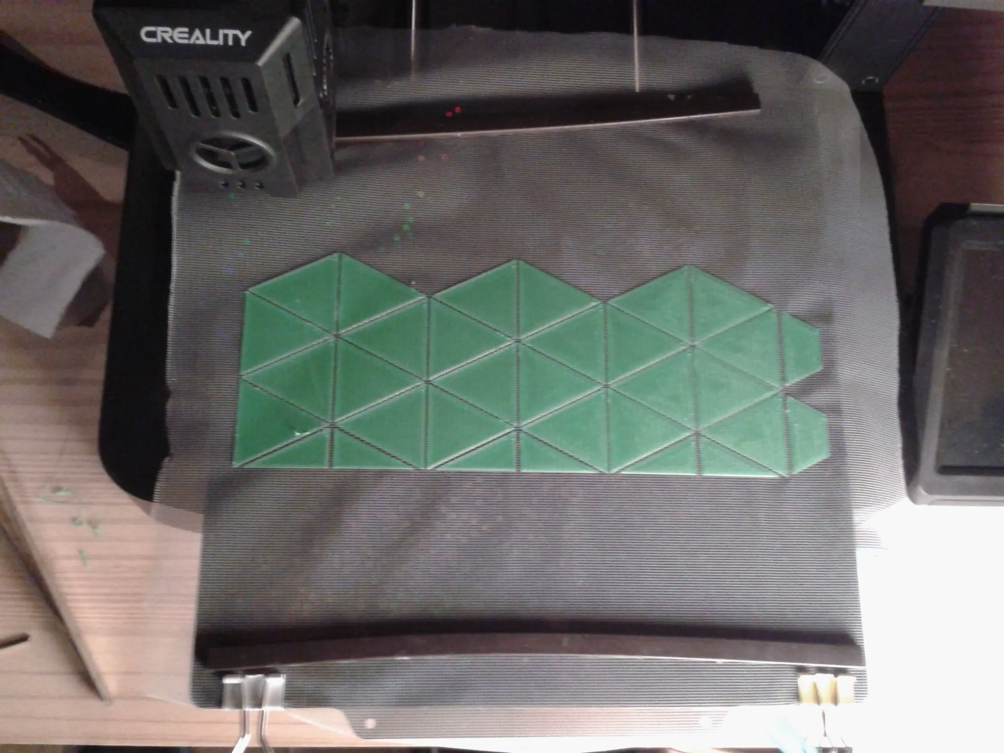 Caleidociclo con textil intercalado entre dos capas