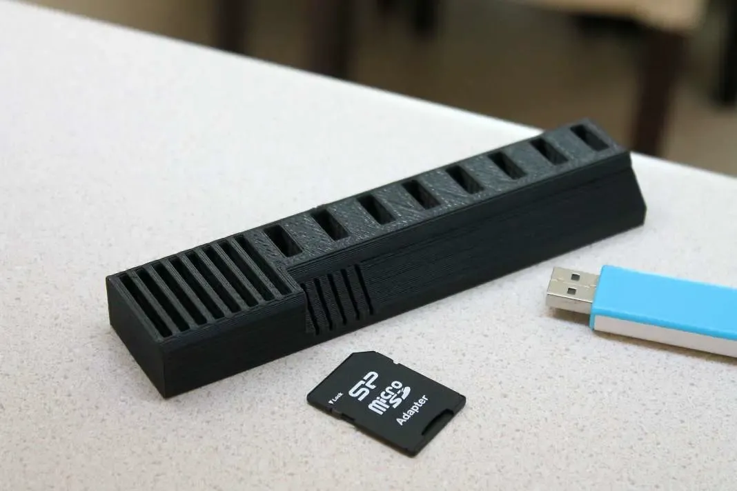 USB and SD card holder for wide USB sticks