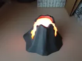 Erupting volcano with glowing lava-1