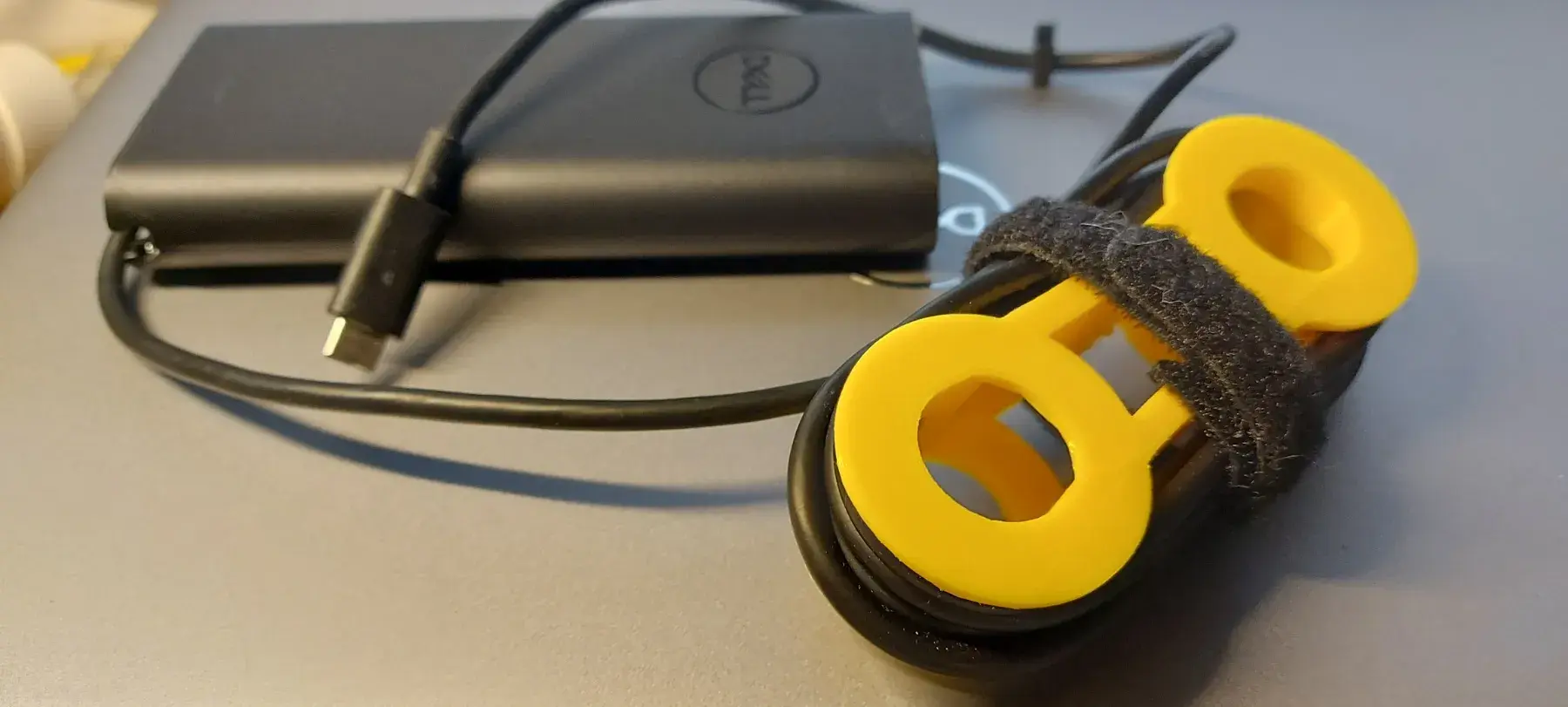 Laptop charger cord spool