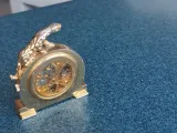 golden clock with 7750-5