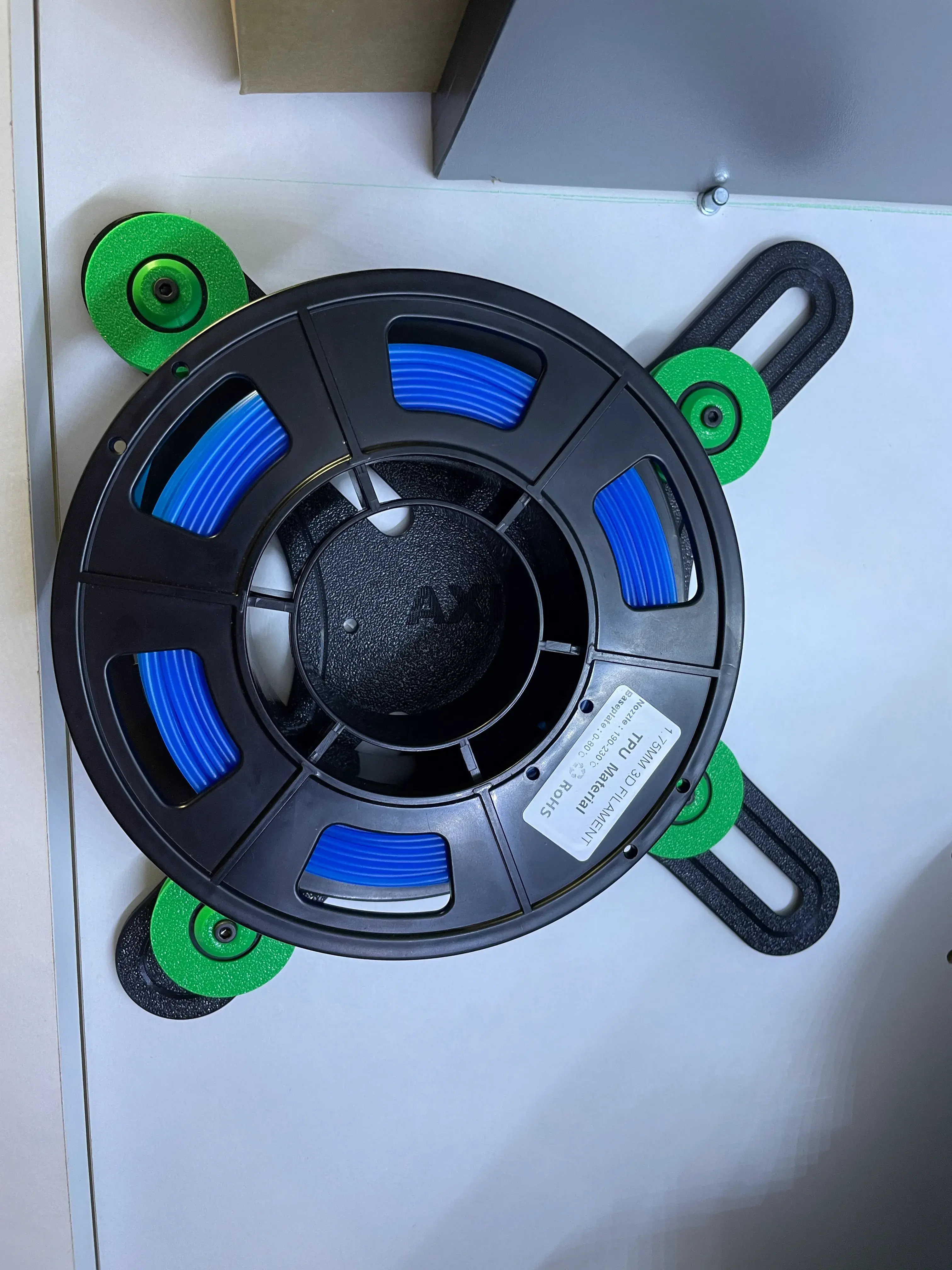 Wall-mounted filament holder (XOLDER)