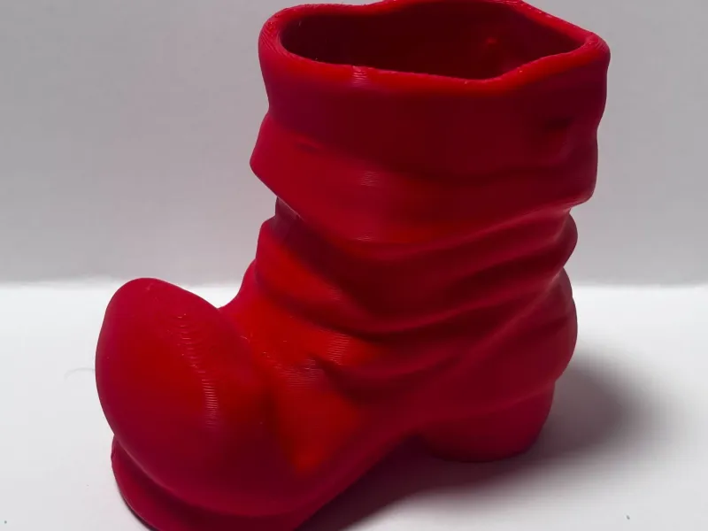 Cuenco de caramelos con bota de Papá Noel navideña