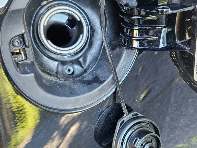 VW fuel cap holder