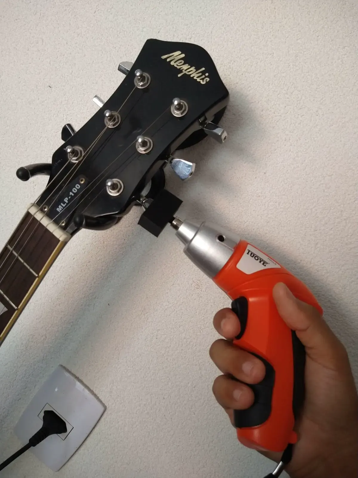 guitar adapter to use as a screwdriver