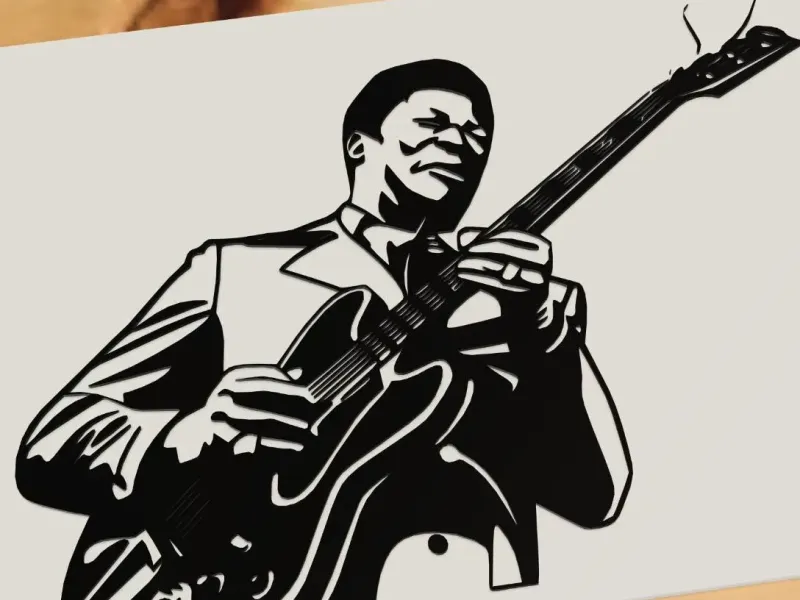 B. B. King playing guitar, King of Blues