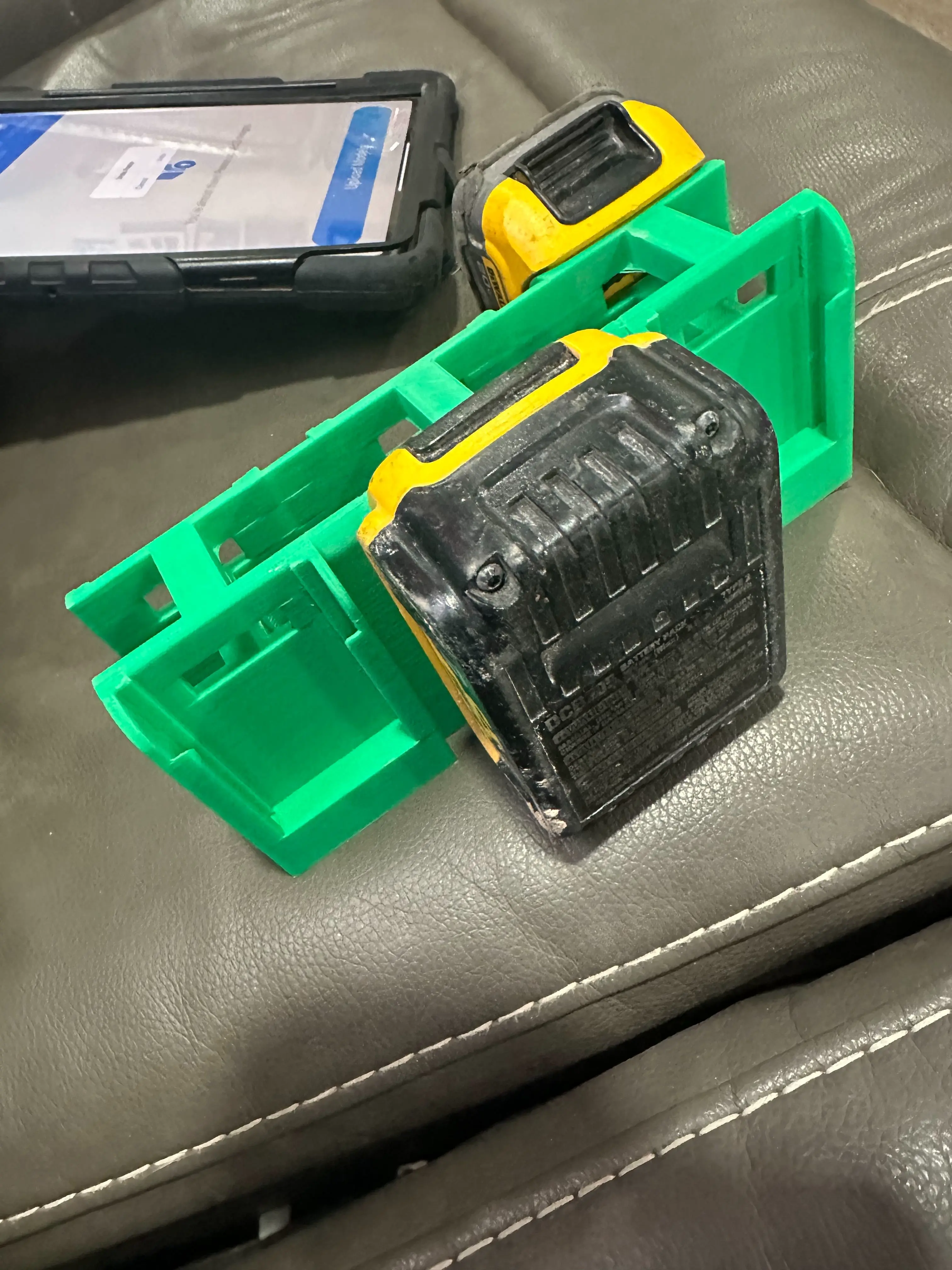 battery holder compatible with Dewalt batteries.