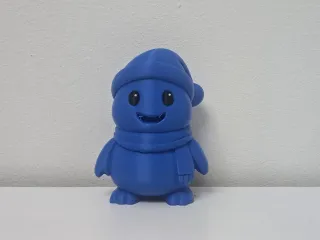 Smiling Penguin with Winter Hat and Scarf Figure