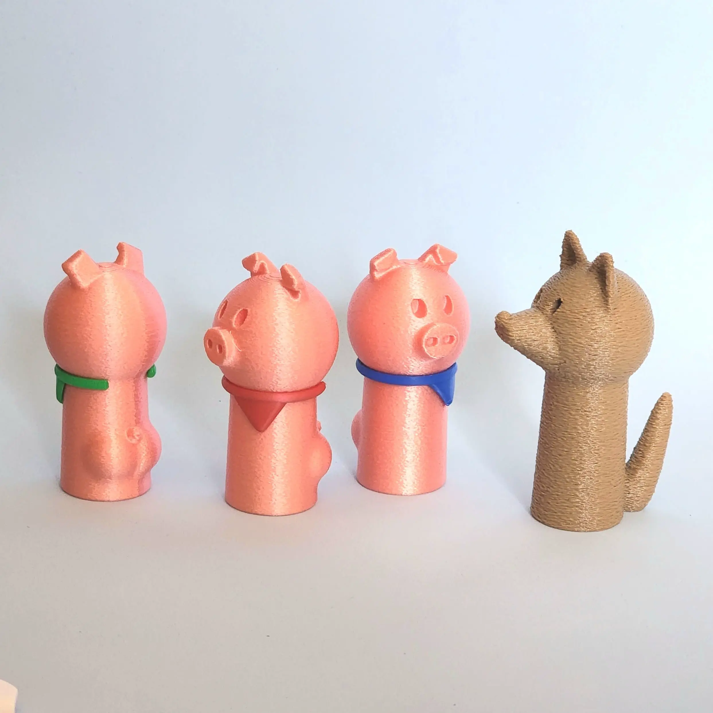 Die drei kleinen Schweinchen Fingerpuppe spielen