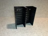 Wall holder for 20 DAT tape cassettes-3