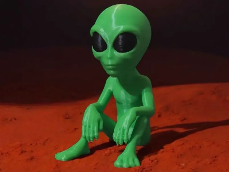 Sitzender Alien
